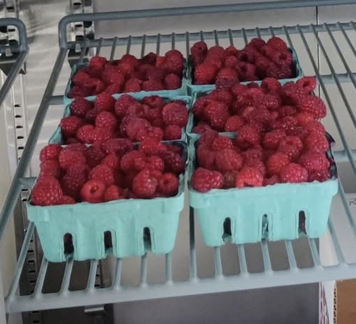 Fresh raspberries in baskets